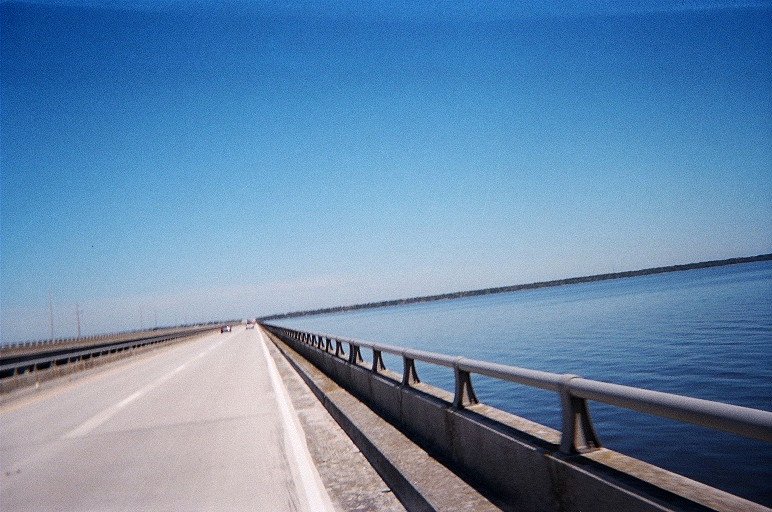 crossingthewrightmemorialbridgepeddlingandshootingphotosnoteasy.jpg